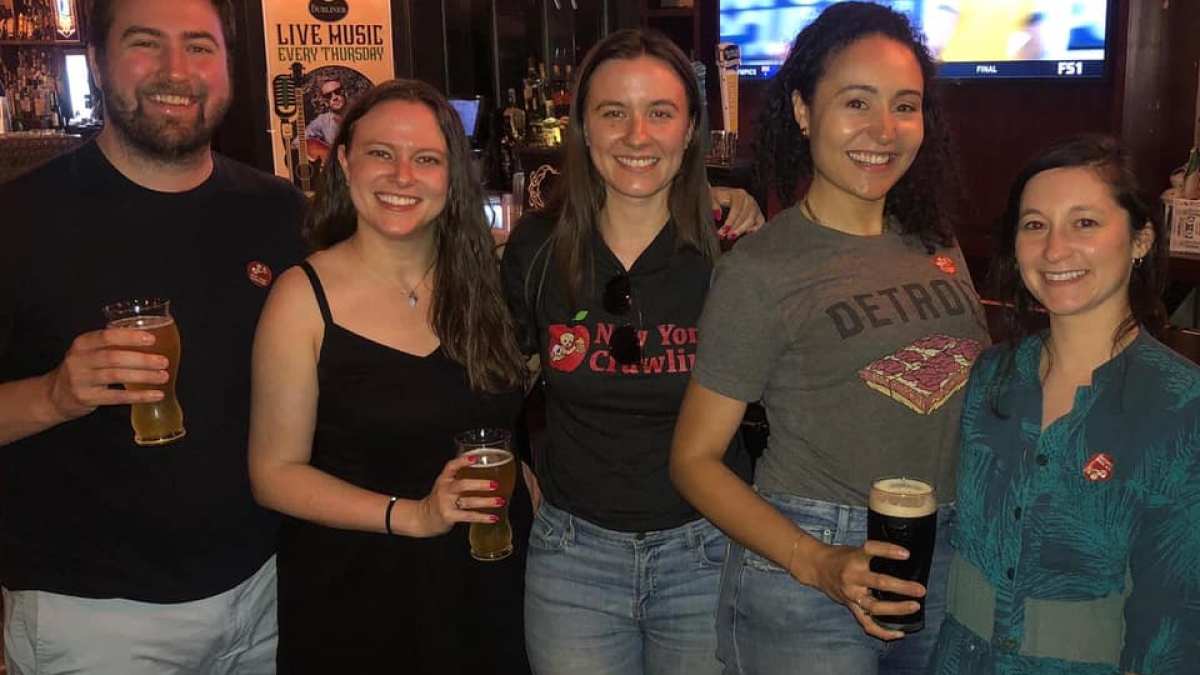 a group of people posing for a photo